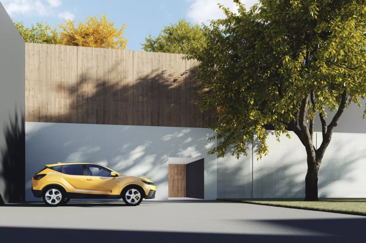 Coche estacionado en la sombra.