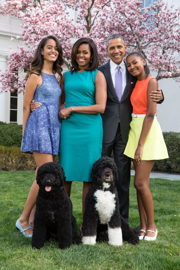 Familia Obama y sus dos perritos