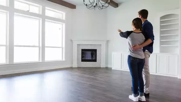 Young couple plan home decor in new home