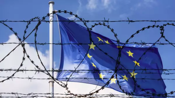 EU Flag and fence with barbed Wire concept Picture