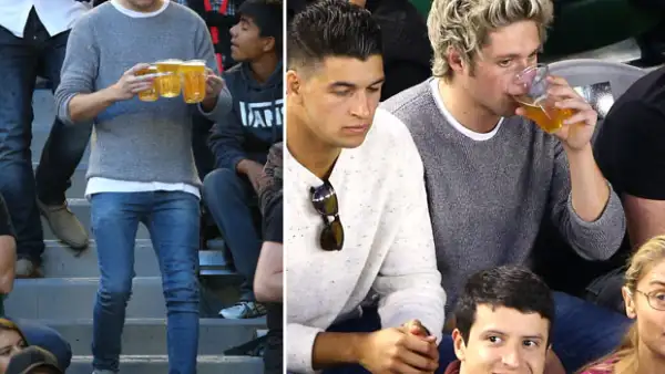 El cantante de 'One Direction' fue captado muy atento al partido de Novak Djokovic, en el Abierto de Australia, disfrutando libremente de unos vasos de cerveza.