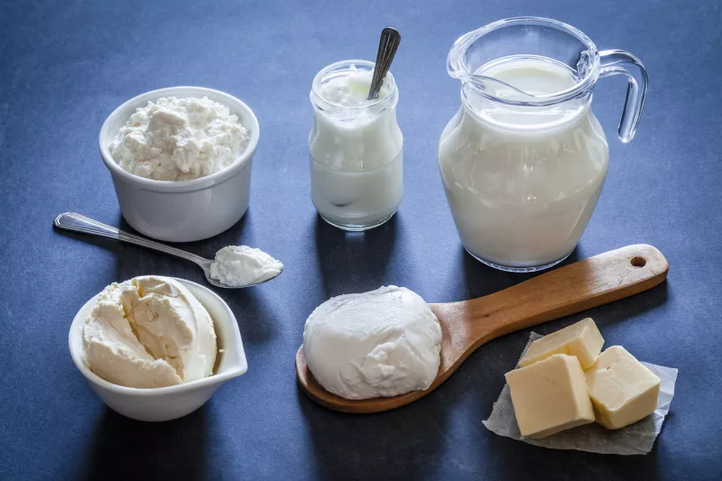 Dairy products shot on bluish tint kitchen table