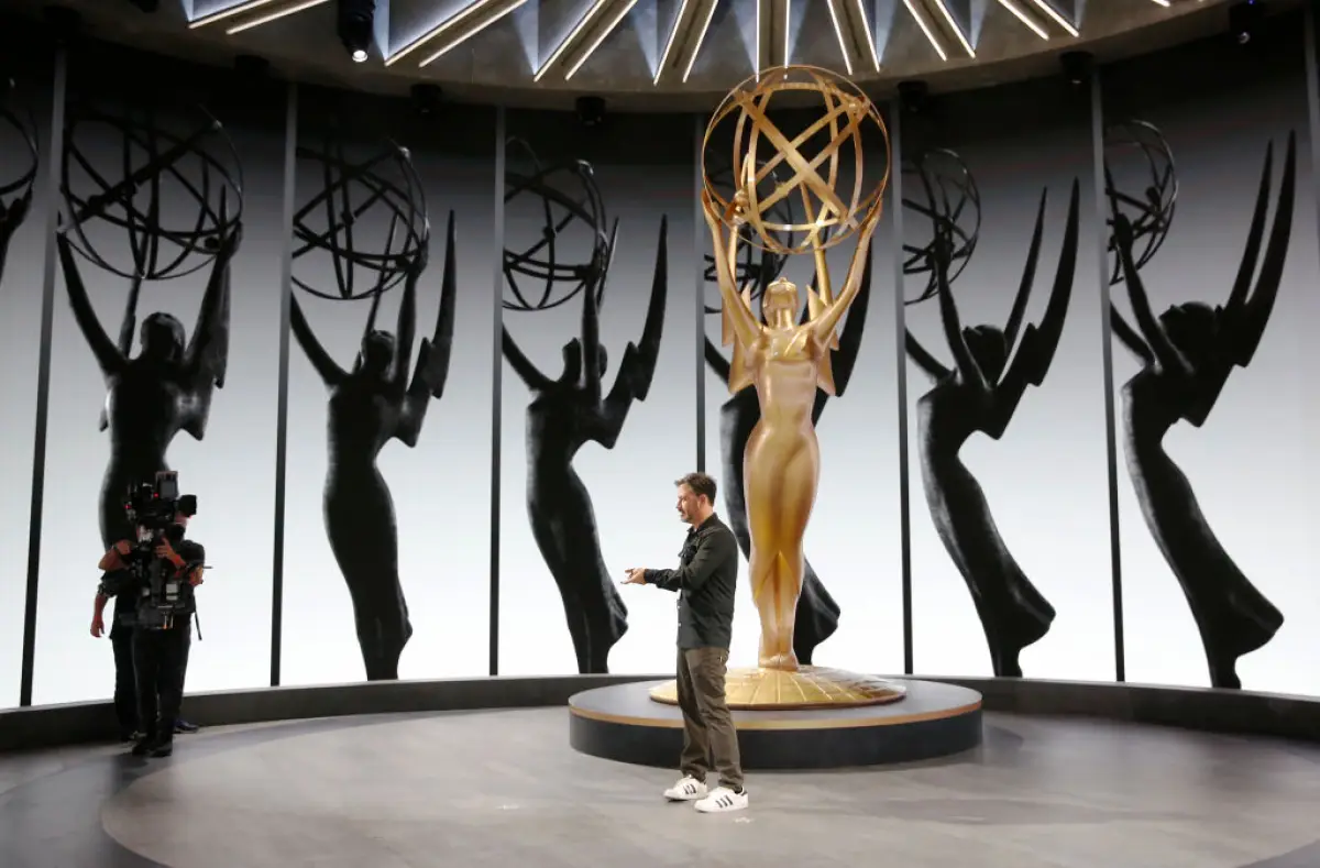 Emmy Host Jimmy Kimmel laughs with stage Manager Gary Natoli during rehearsals Friday for the 72nd Annual Emmy Awards taking place at Staples Center this Sunday.