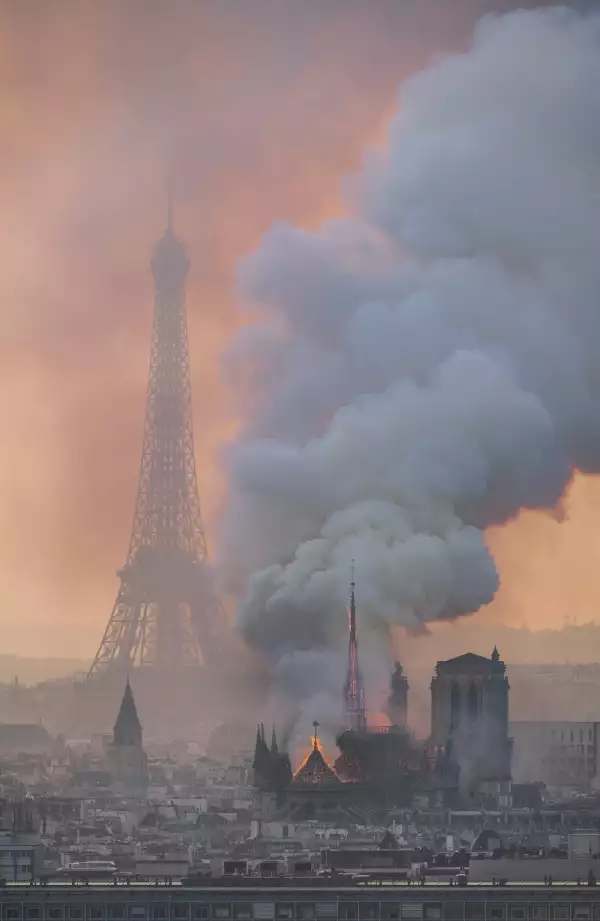 France paris unesco notre dame de paris cathedral during fire april eiffel tower