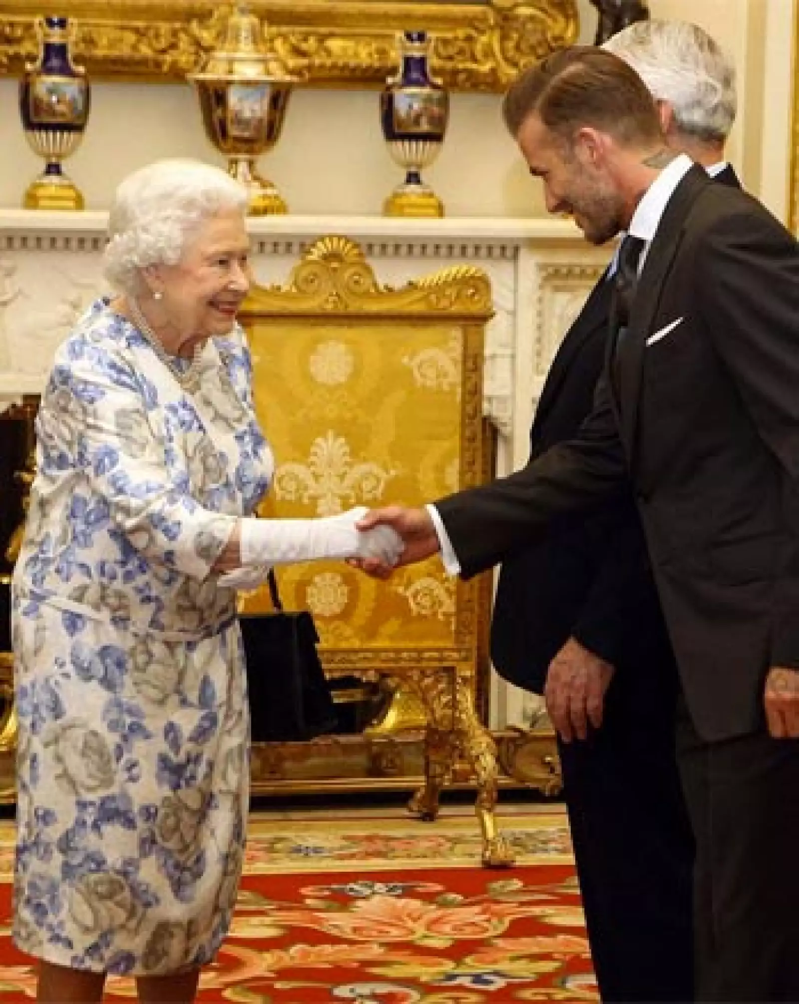 La reina Isabel II y David Beckham