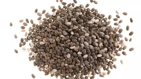 Pile of chia seeds on white