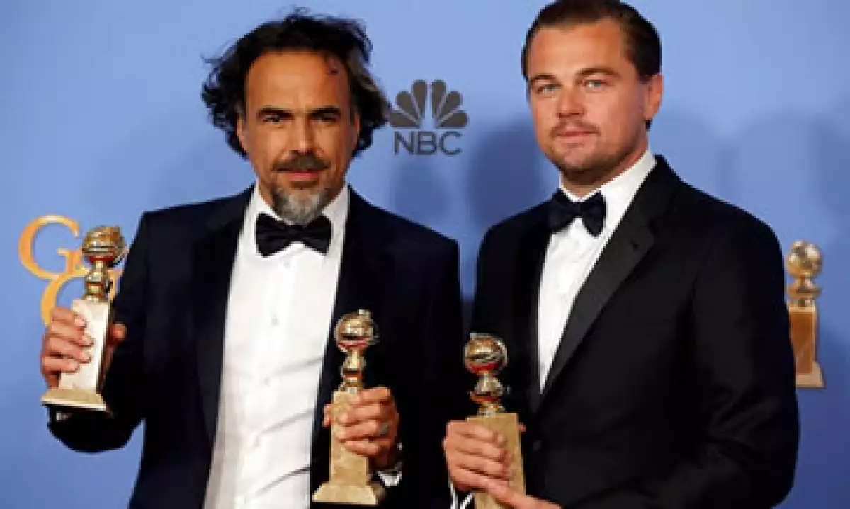 González Iñárritu y DiCaprio, en una noche dorada. (Foto: Reuters)