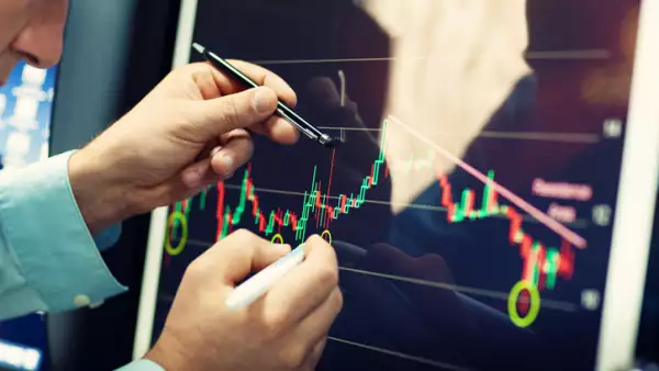 Online financial analysis on a computer monitor.