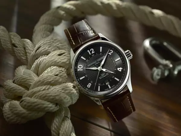 Opción con esfera en color gris oscuro con aguja GMT blanca en contraste