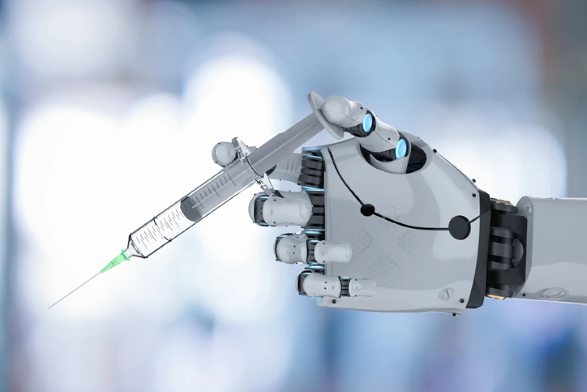 robotic hand holding syringe