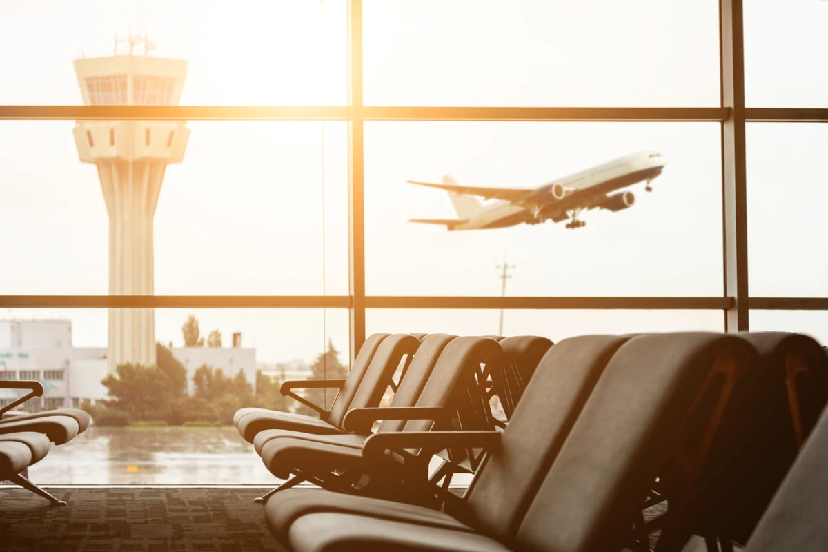 Airport departure all with control tower and airplane on backgro