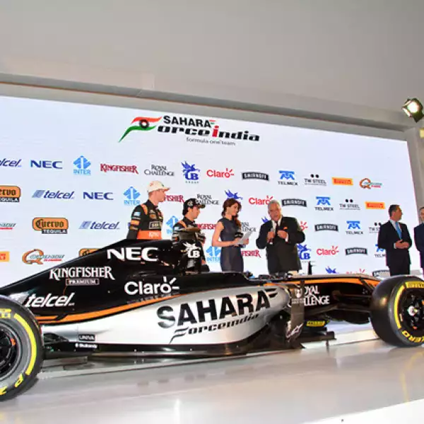 Checo Pérez,Nico Hulkenberg,María José Rojas y Vijay Mallya
