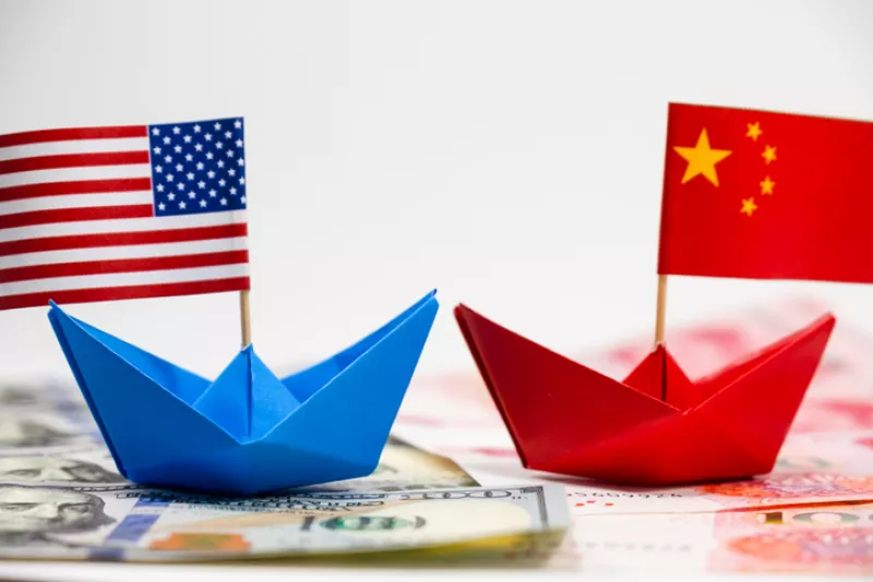 US America flag on blue ship and China flag on red ship and multi color flag with white background of war trade