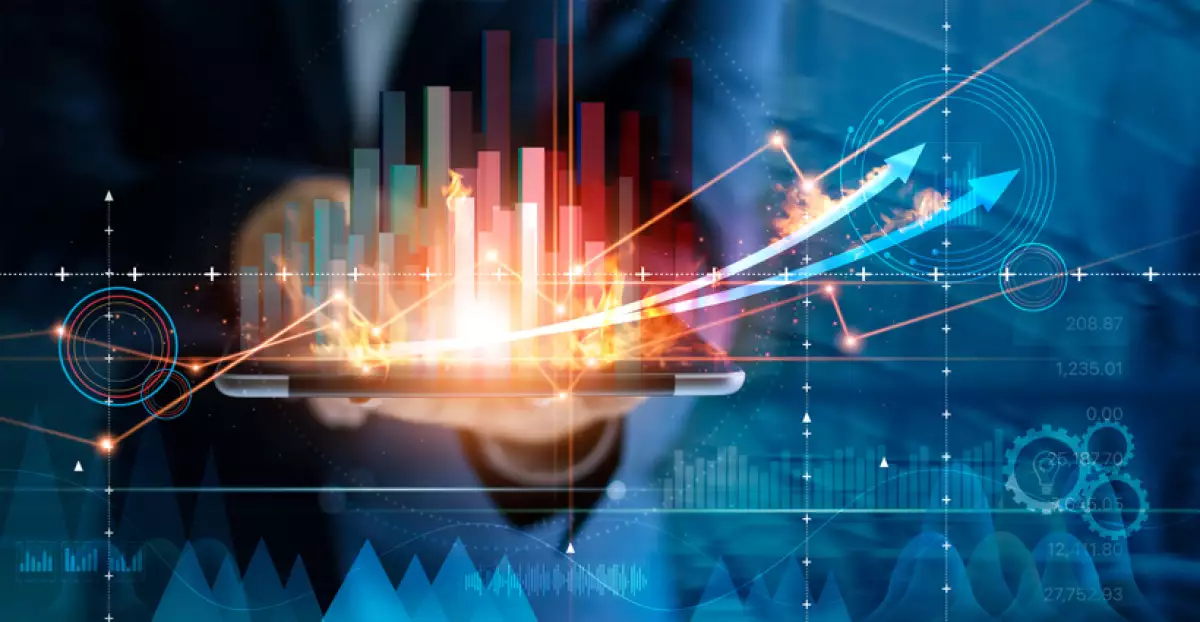 Hot business growth. Businessman using tablet analyzing sales data and economic growth graph chart. Business strategy, financial and banking. Digital marketing.