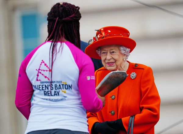 The Queen's Baton Relay At Buckingham Palace