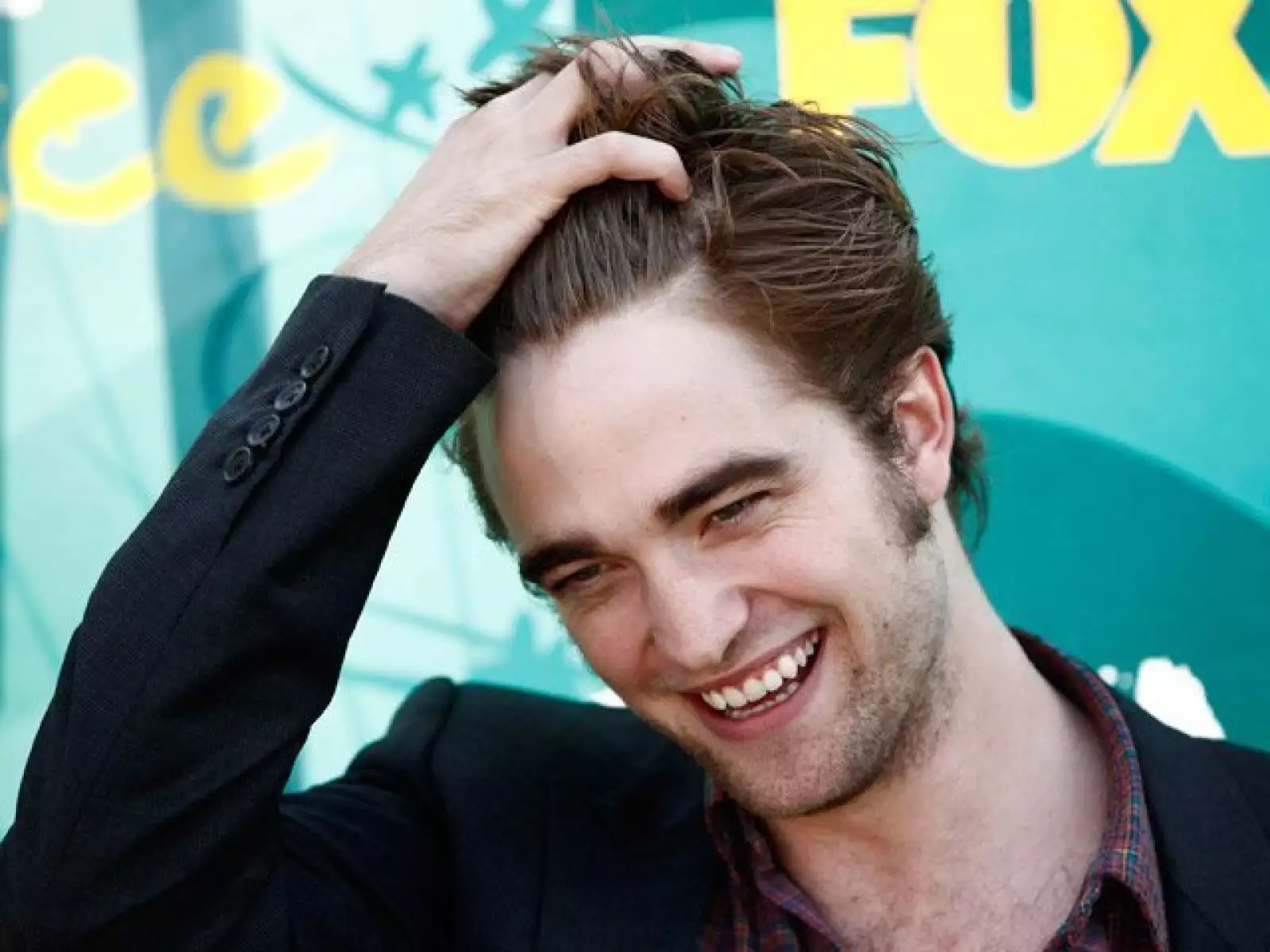 El actor británico Robert Pattinson lidera, a sus 24 años, la lista de los 50 hombres más atractivos del planeta.