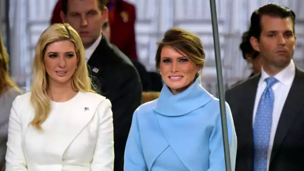 Newly sworn in President Donald Trump with his wife Melania walk down Pennsylvania Avenue in front of the White House