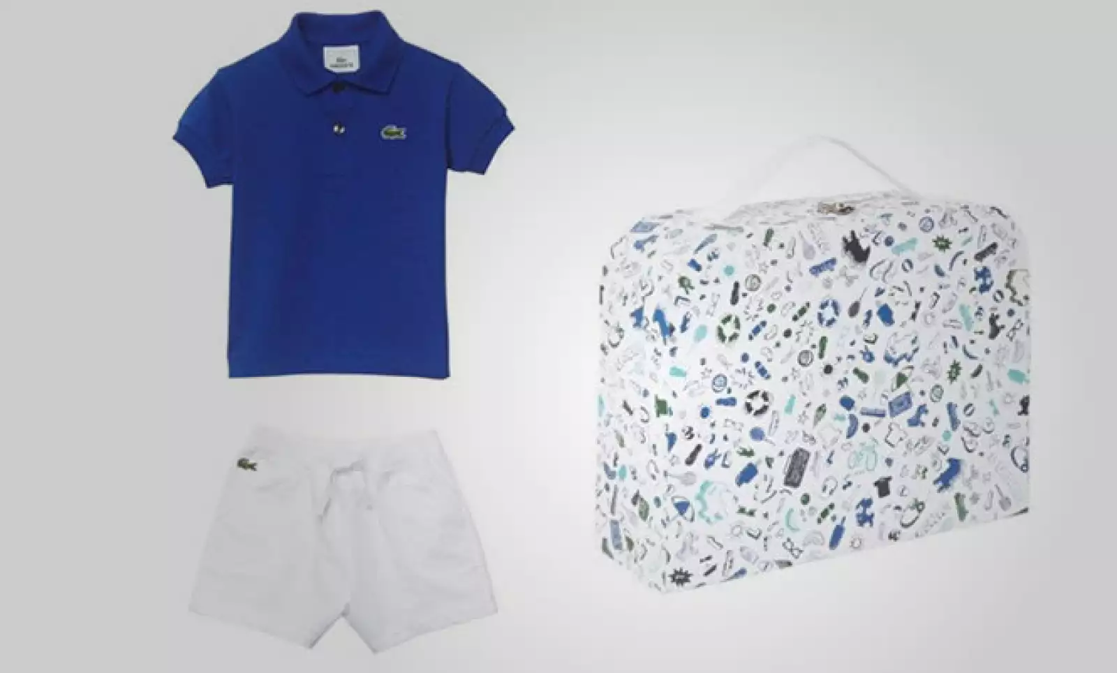 Este paquete para niños contiene una pequeña playera polo en color azul y shorts en color azul.