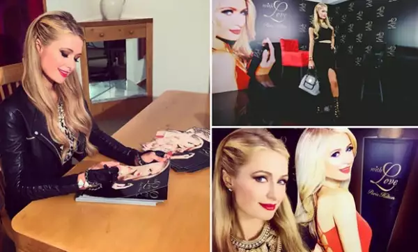 En la conferencia de prensa previo al lanzamiento, Paris preparó algunos autógrafos, además de tomarse una selfie con su "gemela".