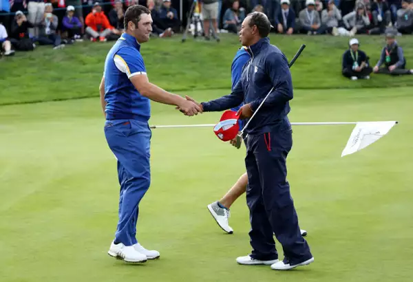 Jon Rahm y Tiger Woods