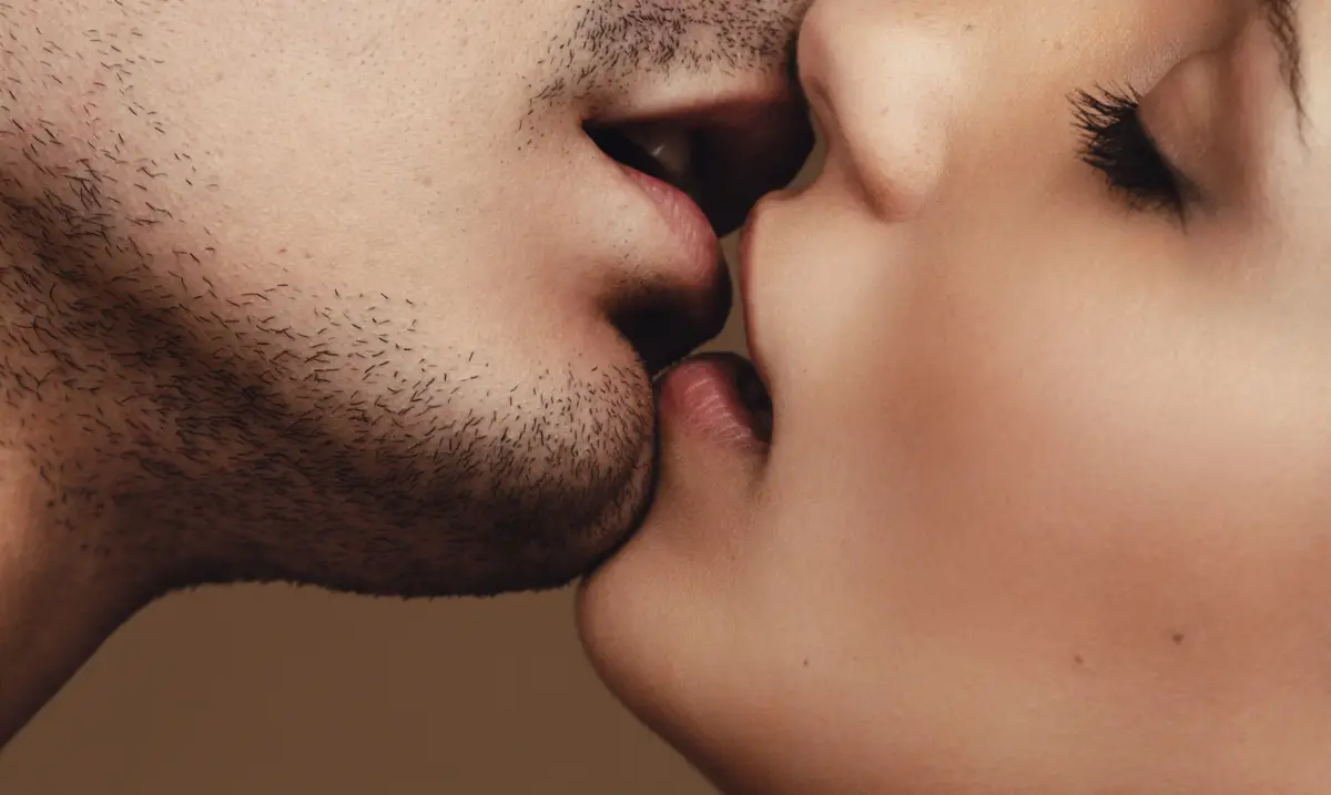 Romantic young couple kissing