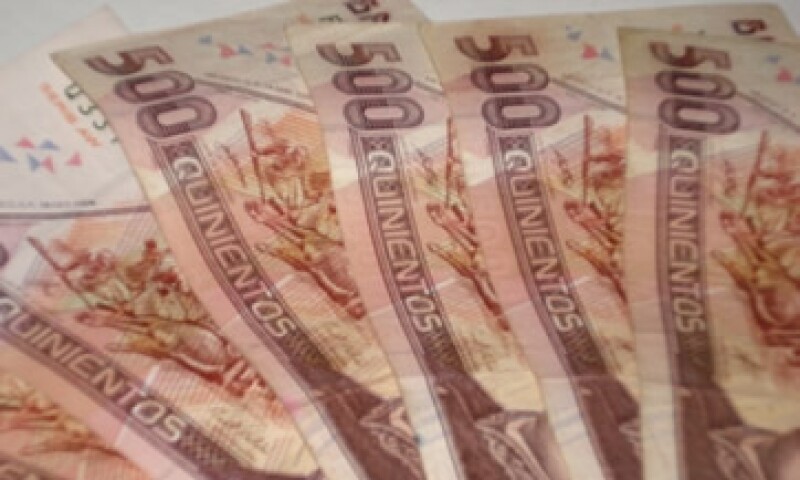 En ventanillas, el dólar se vendió en 11.88 pesos. (Foto: Karina Hernández)