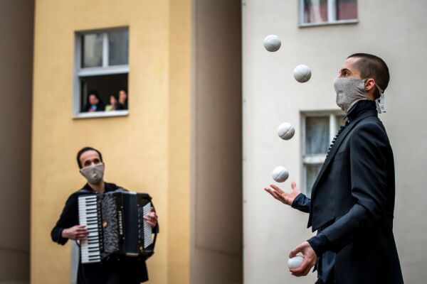 Acrobats Entertain Prague Residents Quarantined Due To Coronavirus