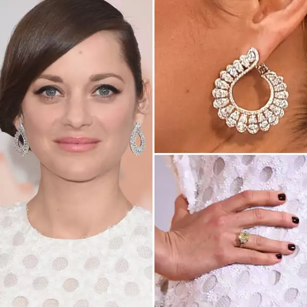 Marion Cotillard usó un anillo de diamantes amarillos y blancos de High Jewellery y aretes de diamantes de Chopard de 13.41k.