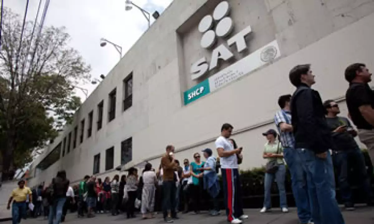A junio de 2013, el SAT alcanzó un total de 39.48 millones de contribuyentes activos. (Foto: Cuartoscuro)