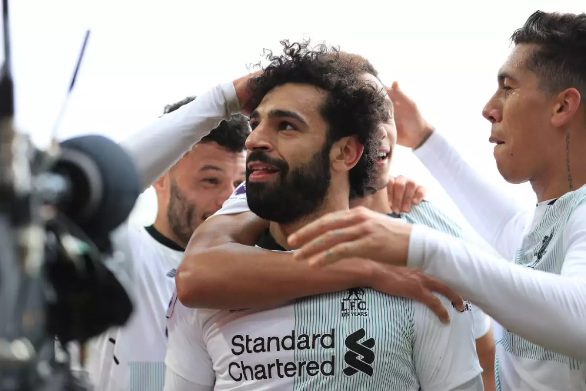 Mohamed Salah festeja con el Liverpool