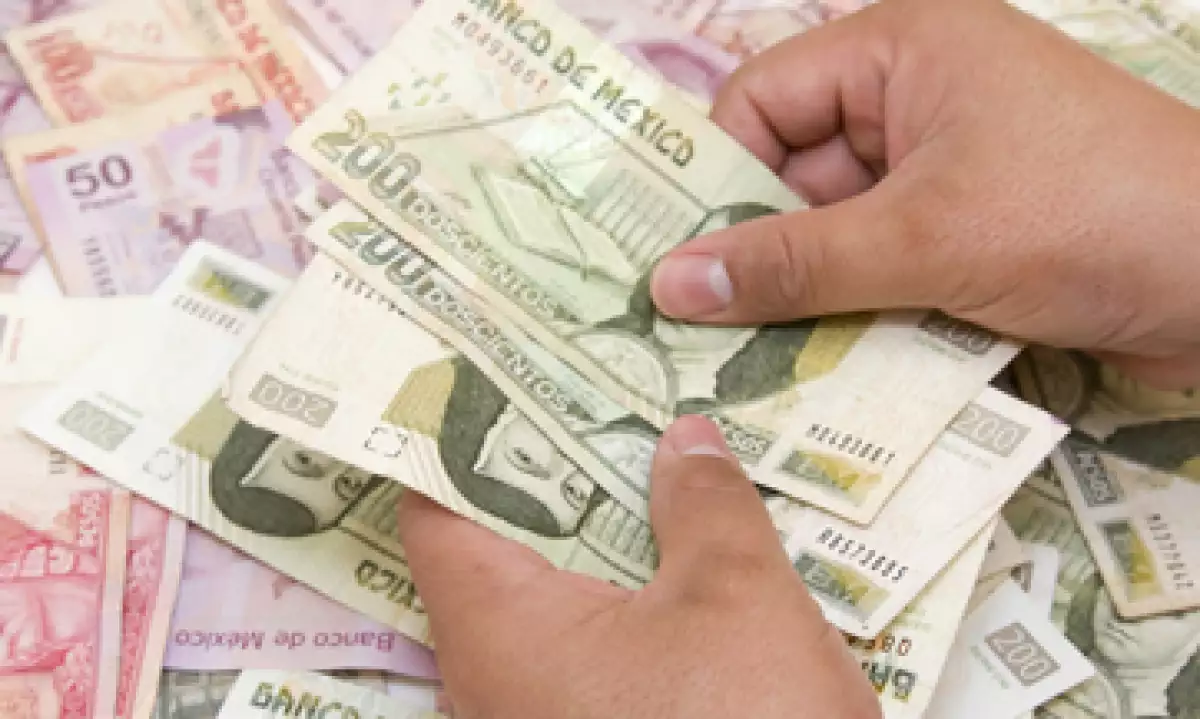 El analista mantiene su pronóstico de que el peso cerrará el año por debajo de los 13 pesos por dólar. (Foto: Getty Images)