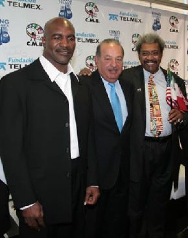Evander Holyfield, Carlos Slim y Don King.