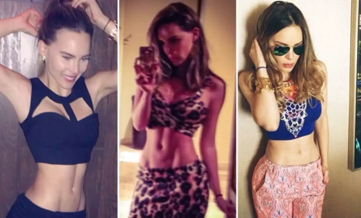 Belinda no pierde la oportunidad de mostrar su abdomen.