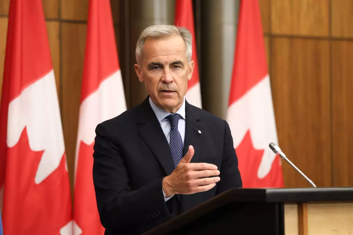 El primer ministro canadiense, Mark Carney, habla durante una conferencia de prensa después de una reunión del Gabinete para discutir tanto las negociaciones comerciales con los Estados Unidos como la situación en el Medio Oriente, en el Teatro Nacional de Prensa en Ottawa, Ontario, Canadá, el 30 de julio de 2025. Canadá "tiene la intención" de reconocer a un estado palestino en la Asamblea General de la ONU en septiembre, dijo el miércoles el primer ministro Mark Carney, un cambio dramático de política que dijo que era necesario para preservar las esperanzas de una solución de dos estados.