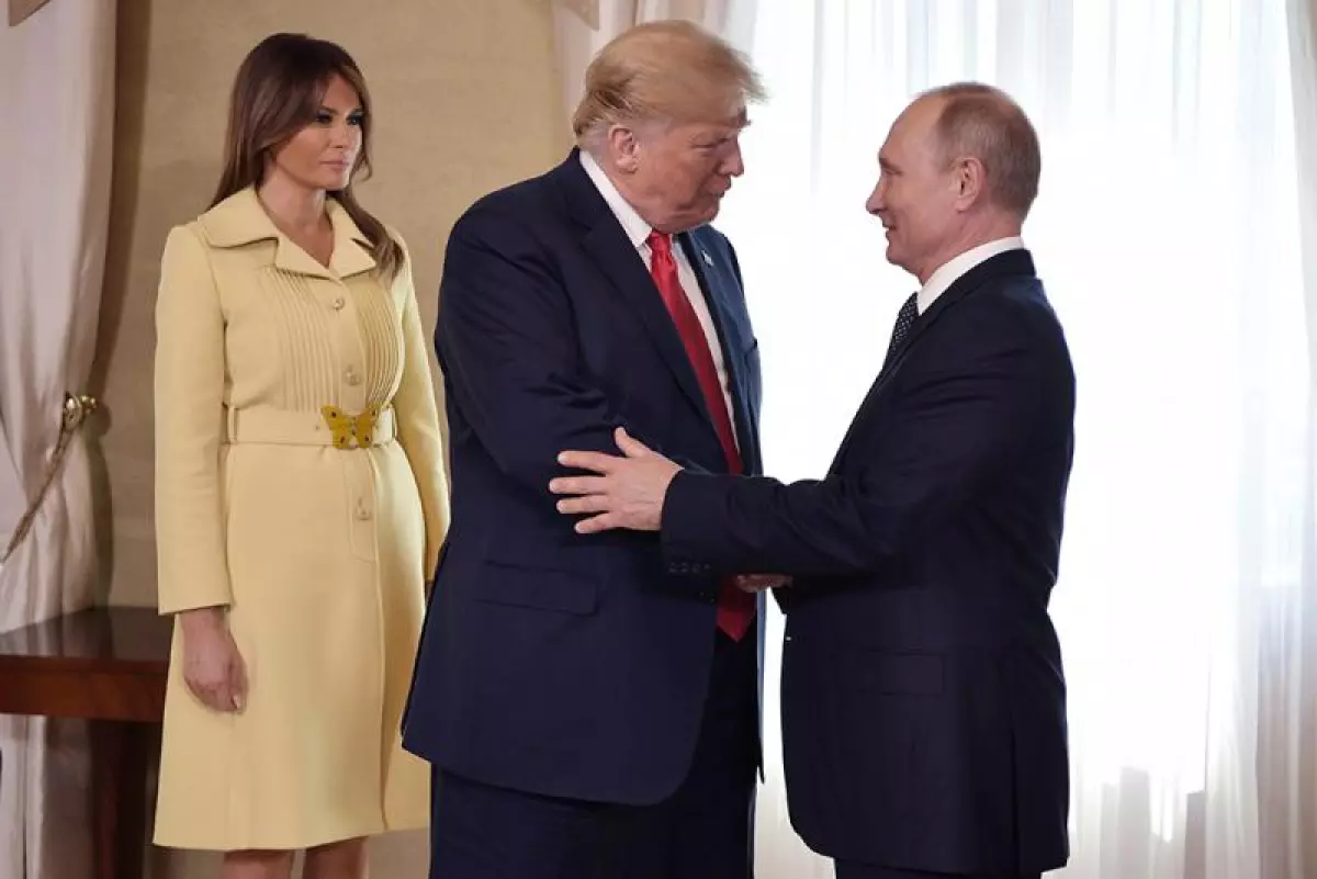 Melania con Vladimir Putin