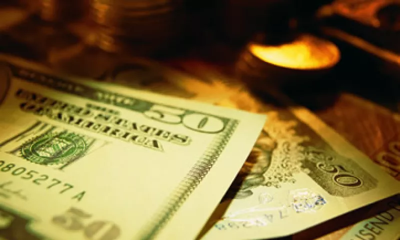 El tipo de cambio es de 13.2087 pesos, para solventar obligaciones denominadas en moneda extranjera: Banxico. (Foto: Thinkstock)