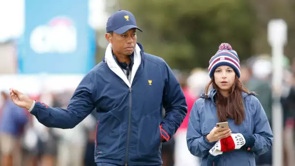 Erica Herman y Tiger Woods
