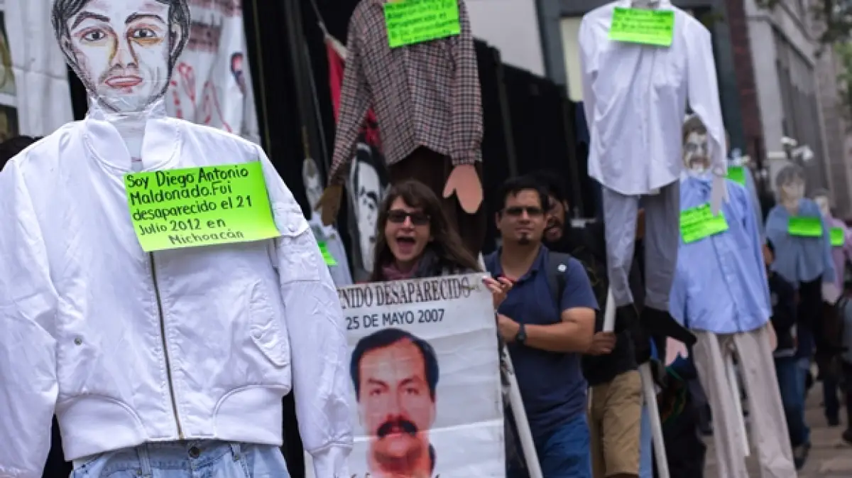 Así funcionará el Centro de identificación humana en México. (Familiares de personas desaparecidas protestando).  