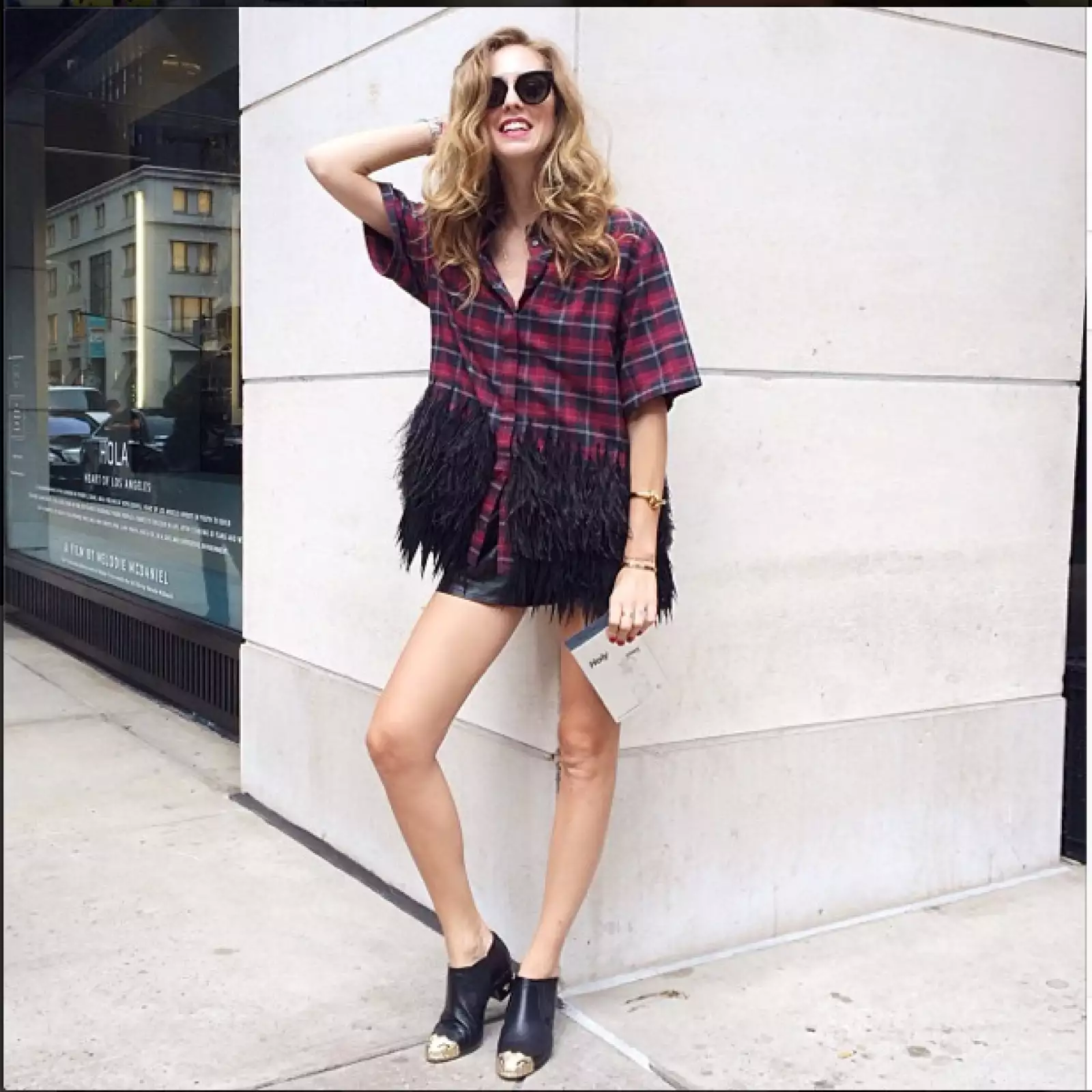 Chiara Ferragni @chiarraferragni: First look for today: @n21_official shirt, Chanel boots, Celine sunglasses and @holykmovement clutch #nyfw #theblondesaladgoestonyfw