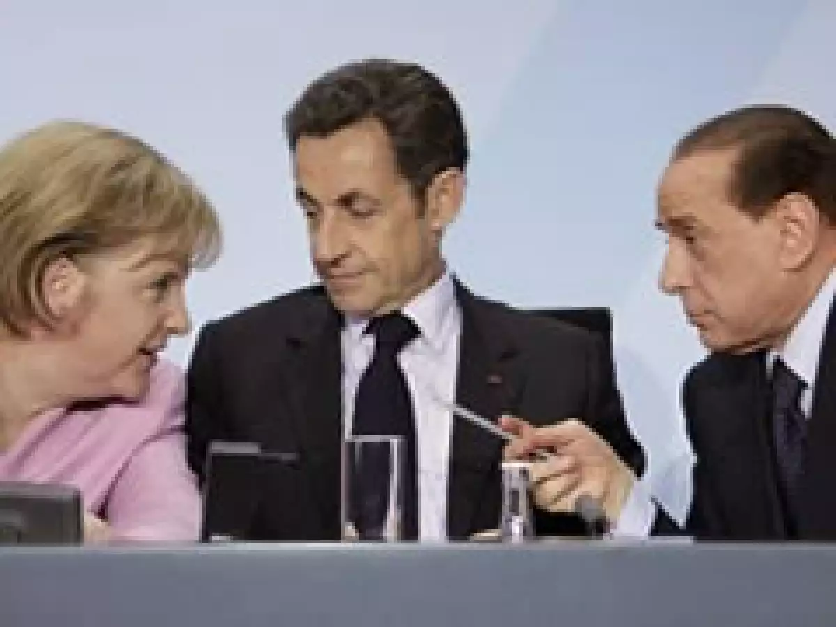 Merkel, Sarkozy y Berlusconi, durante la reunión en Alemania. (Foto: Reuters)