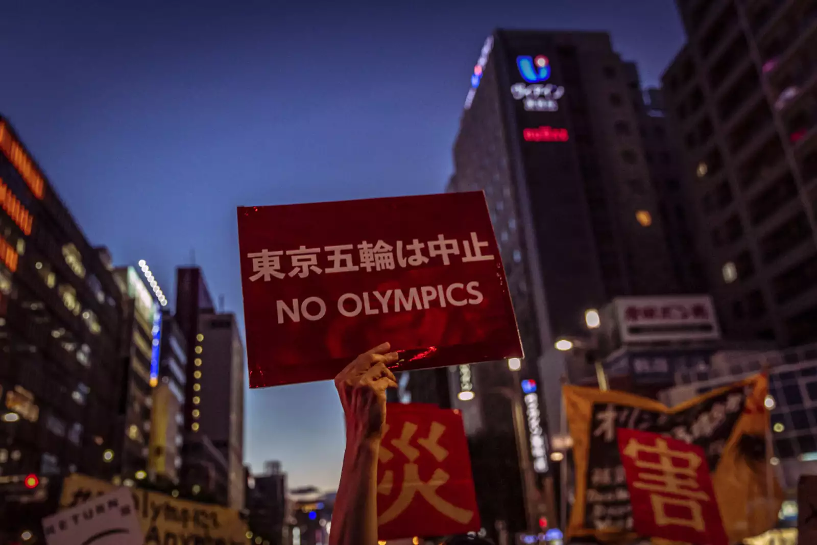 Protesters March Against The Tokyo Olympics