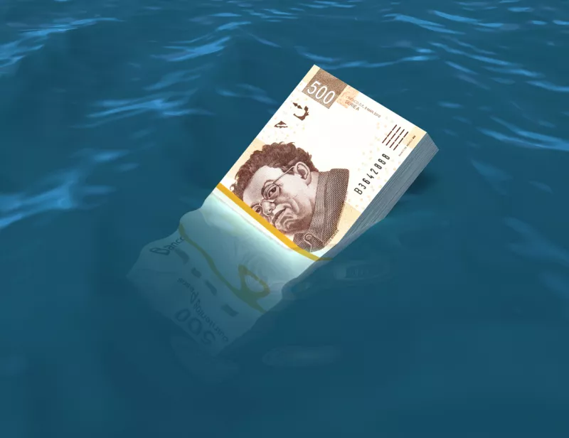 Money sinking in water