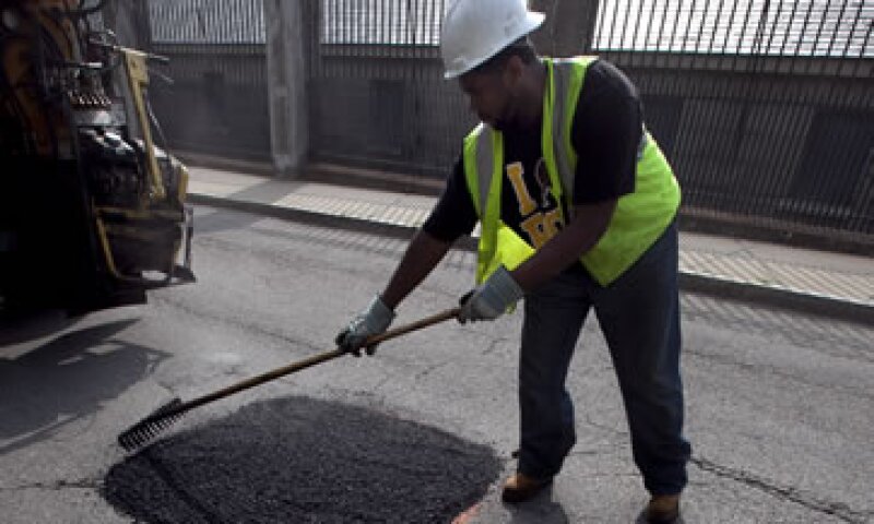 Los empleados de Boston rellenan unos 19,000 baches al año. (Foto: AP)