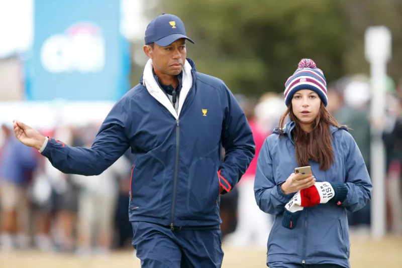 Erica Herman y Tiger Woods