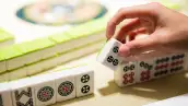 Playing,Mahjong,On,The,Table