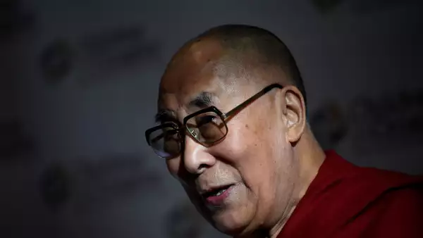 FILE PHOTO: Tibetan spiritual leader the Dalai Lama, Patron of Children in Crossfire, speaks during a press conference in Londonderry