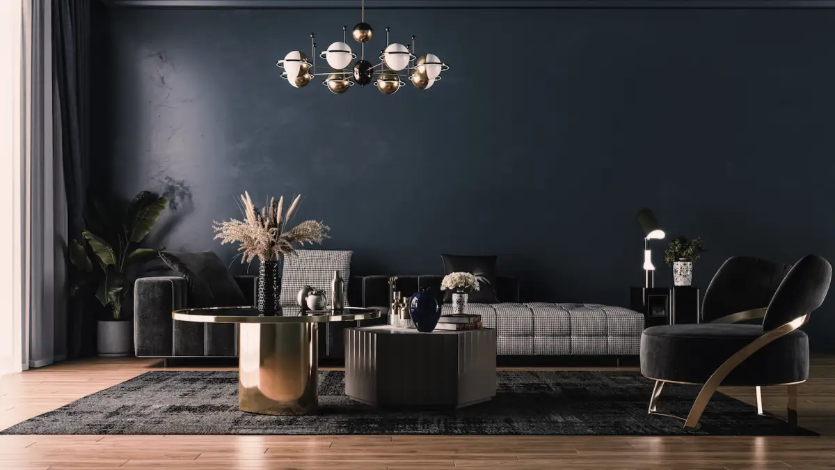 Modern interior design of upholstered furniture against the background of a classic wall.