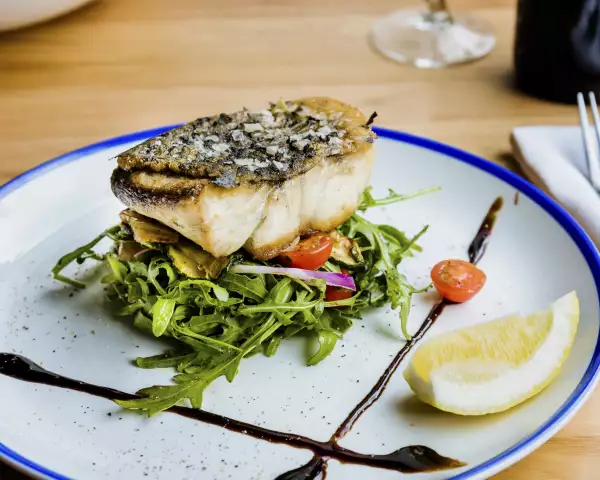Plate of fish with vegetables