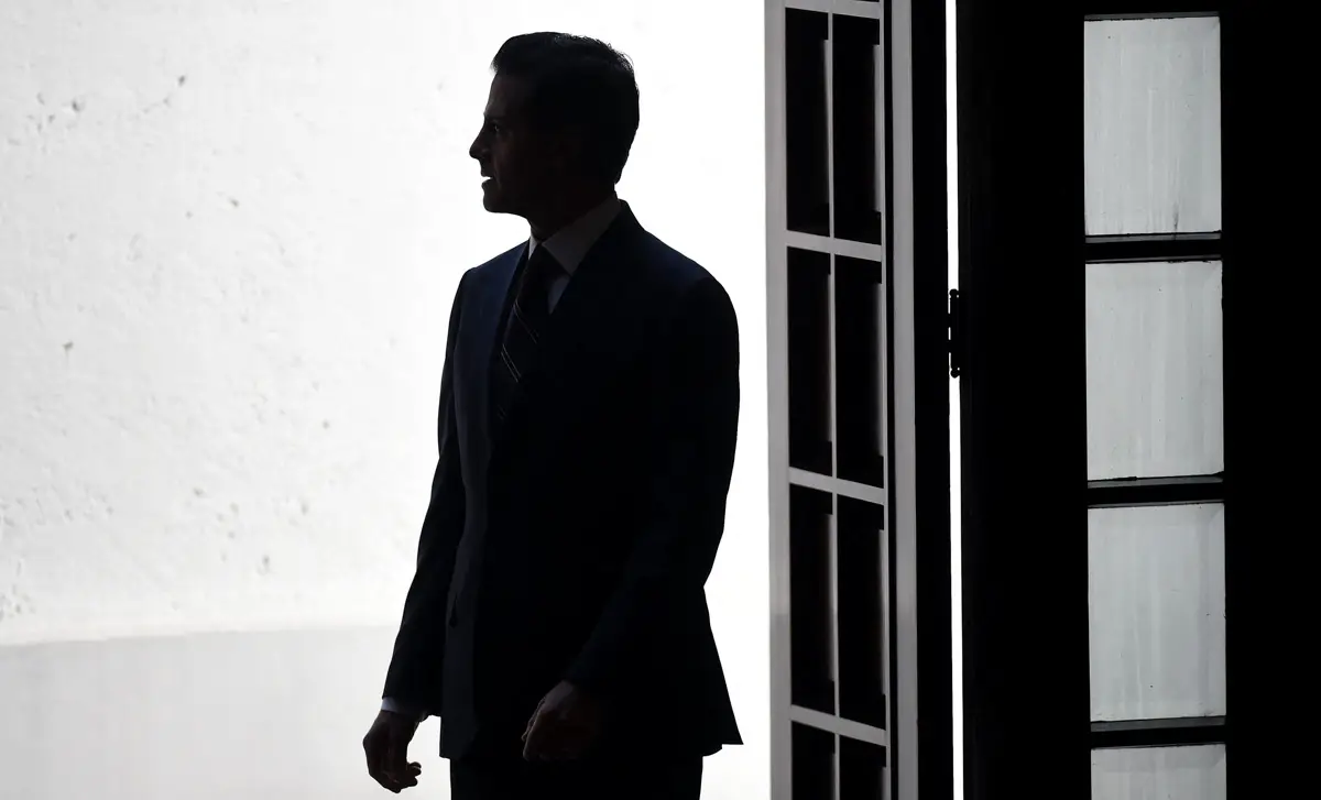 (El presidente de México, Enrique Peña Nieto, llega a la residencia presidencial de Los Pinos en la Ciudad de México el 4 de enero de 2017)