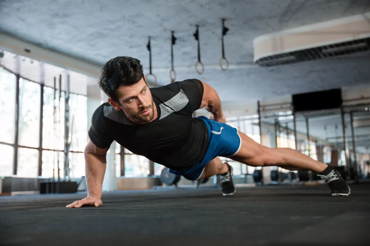 Portrait,Of,A,Handsome,Man,Doing,Push,Ups,Exercise,With